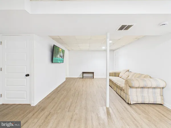 a bedroom with a bed and a table