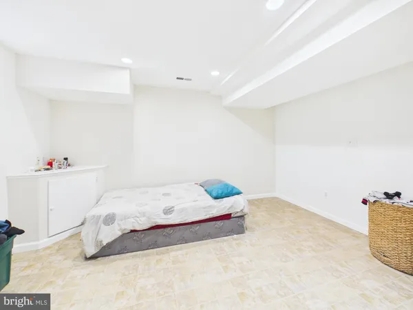 a room with furniture and wooden floor