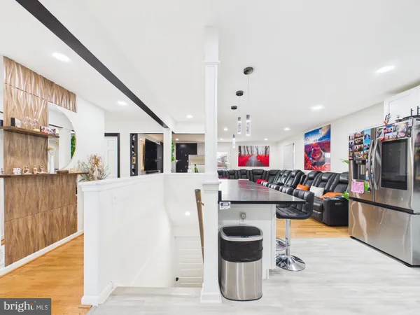 a kitchen with a sink and a stove top oven