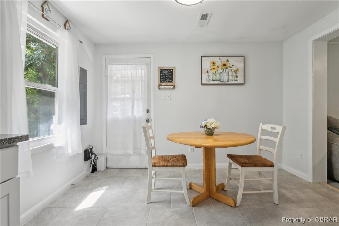 320 Leigh Road Yorktown, VA 23690 - Photo 9 of 31 Tiled dining space with electric panel