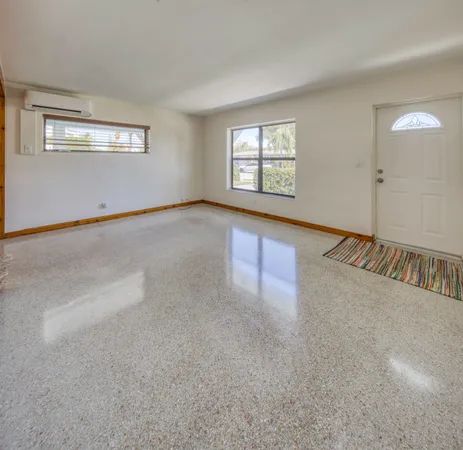 an empty room with windows