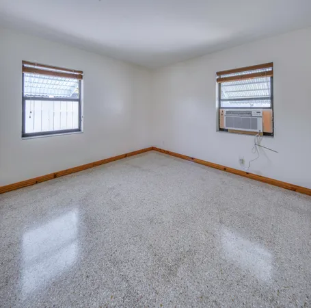 a view of a room that has a window in it