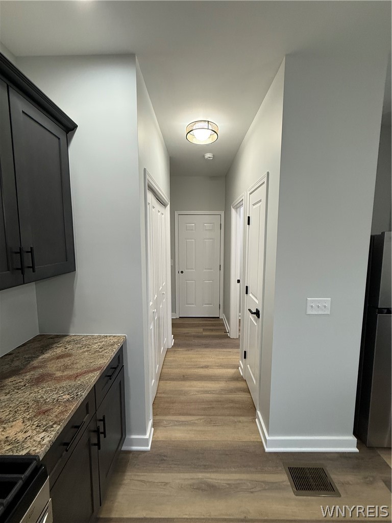 5156 Berg Road Buffalo, NY 14218 - Photo 7 of 31 Hallway to 1/2 bath first floor