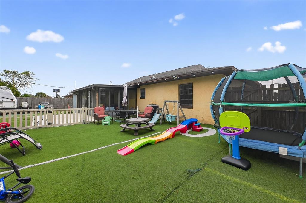 1644 Ruth Street Cocoa, FL 32926 - Photo 28 of 38 a house view with swimming pool outdoor seating space