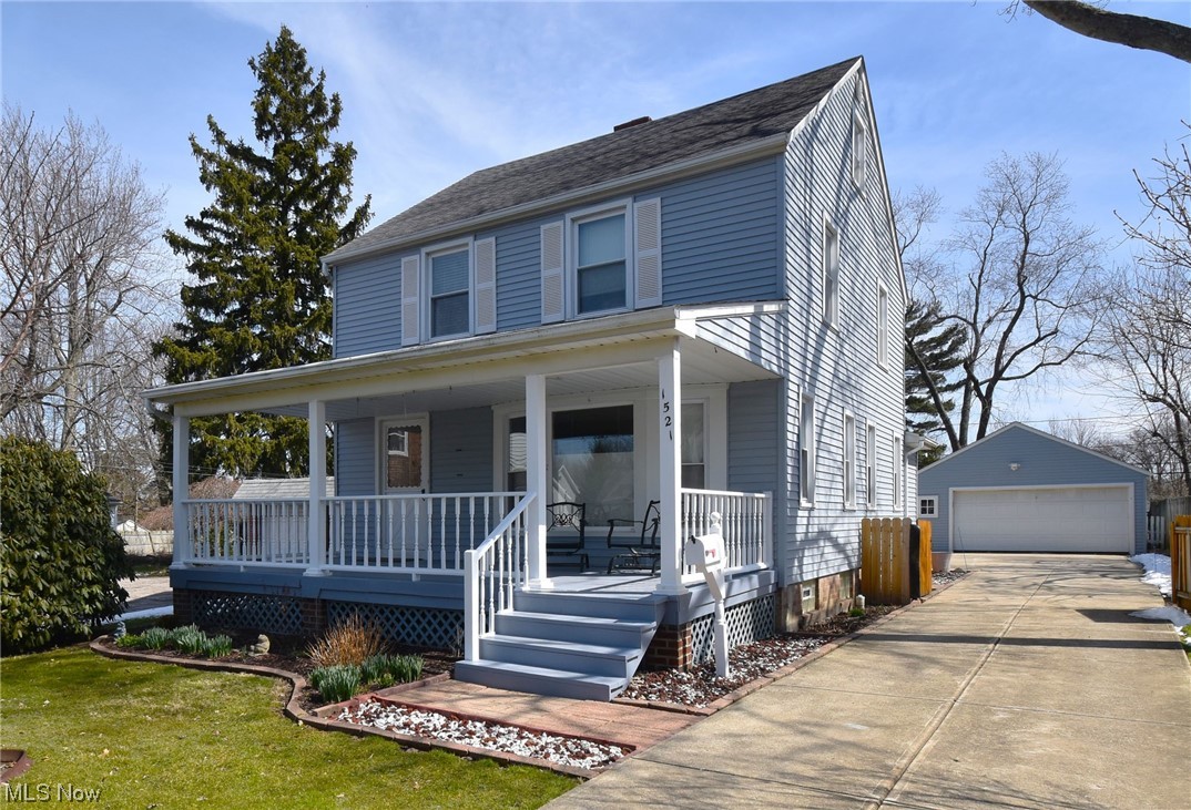 1521 Sheffield Road Cleveland, OH 44121 - Photo 1 of 29 Sunny and Bright Colonial with Covered Porch!