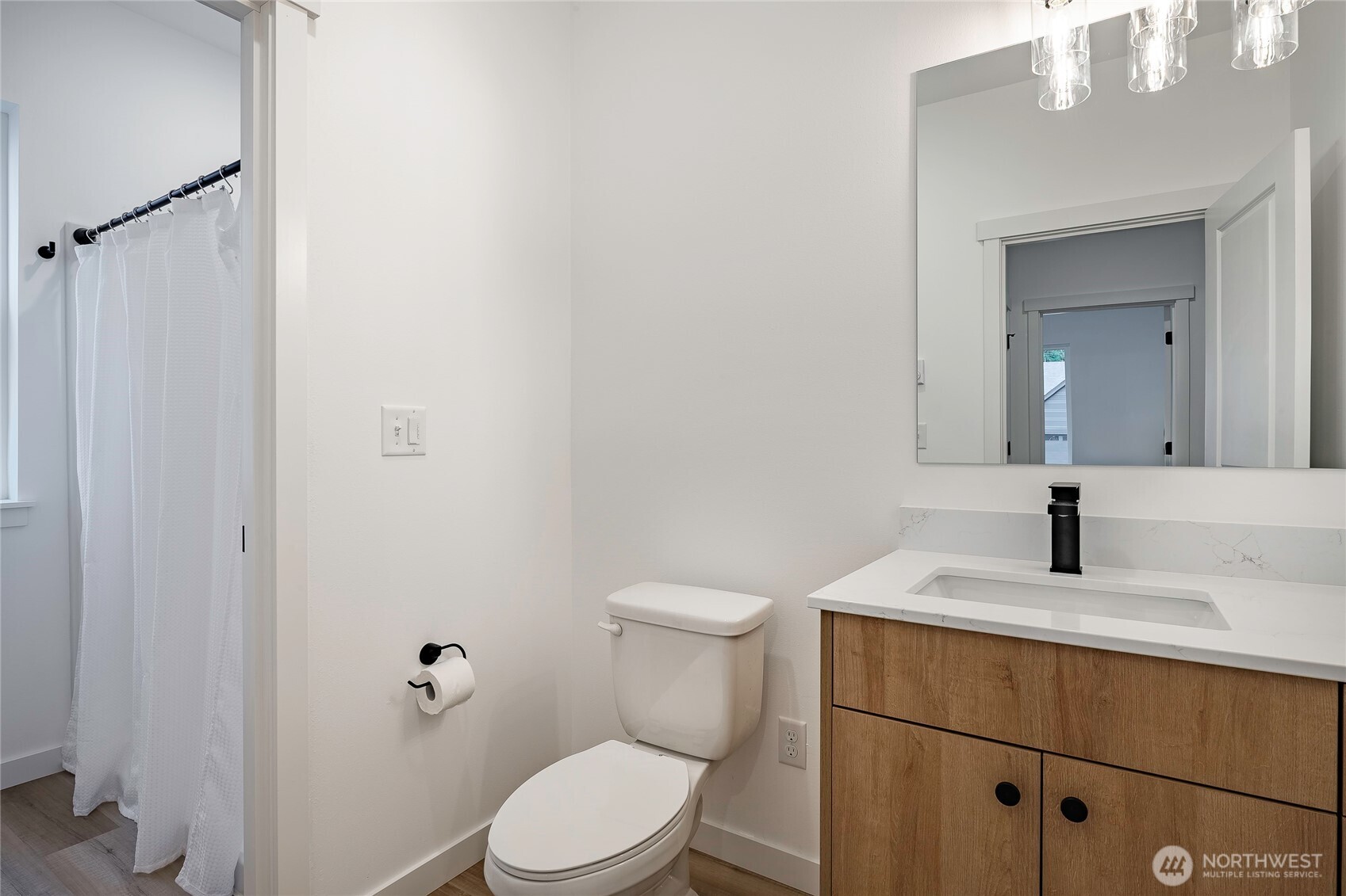 2999 Cedar View Road Blaine, WA 98230 - Photo 31 of 37 a bathroom with a toilet a sink and mirror