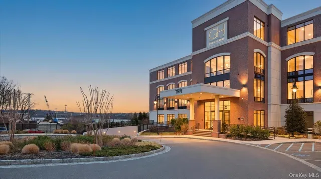 a front view of a building with street view