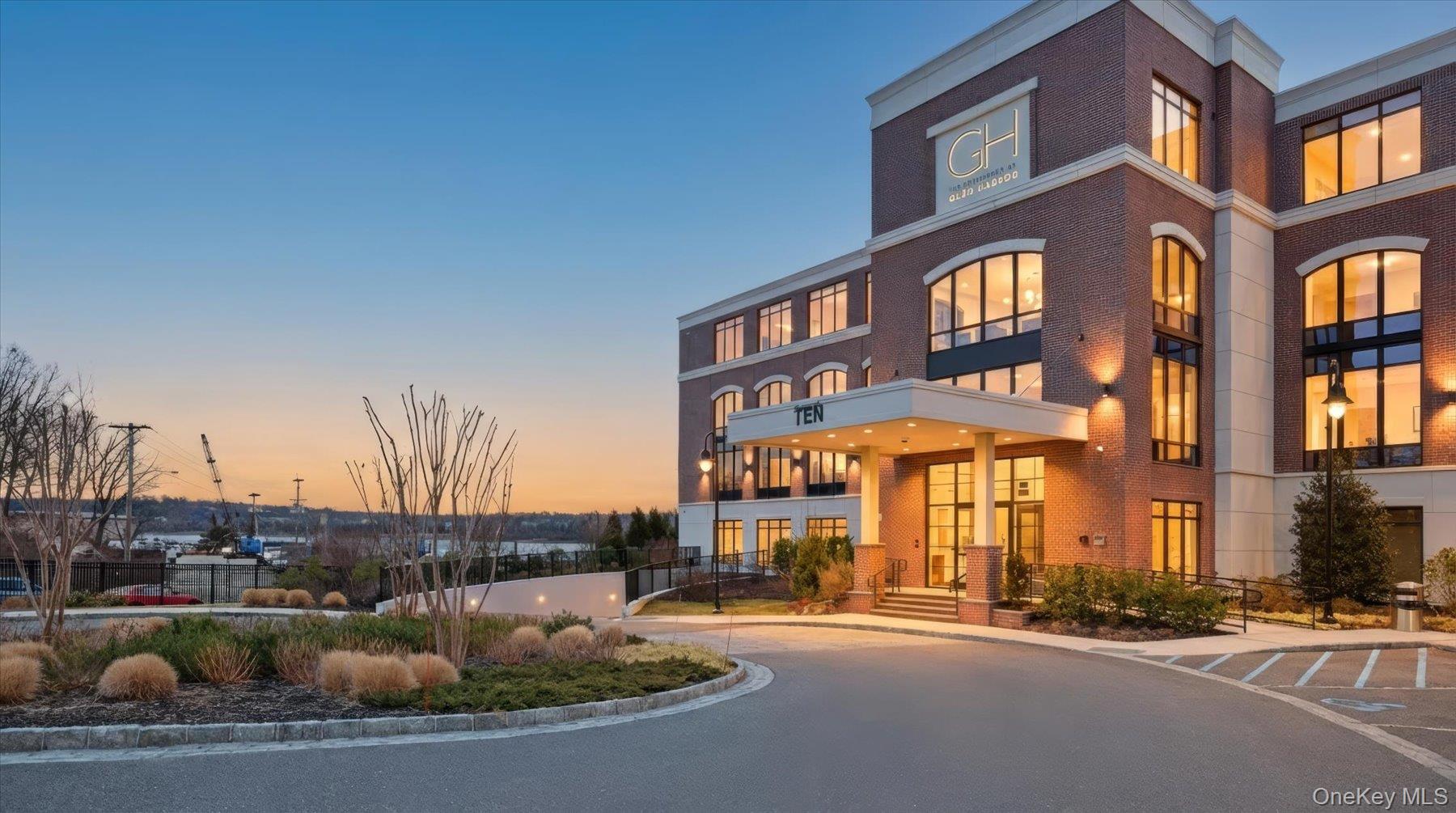 10 Shore Road, Unit 108 Glenwood Landing, NY 11547 - Photo 2 of 20 a front view of a building with street view