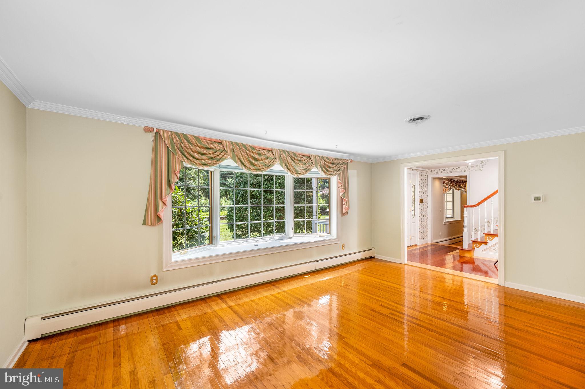 603 Street Road West Chester, PA 19382 - Photo 11 of 41 Living Room, Bay Window, Crown Molding
