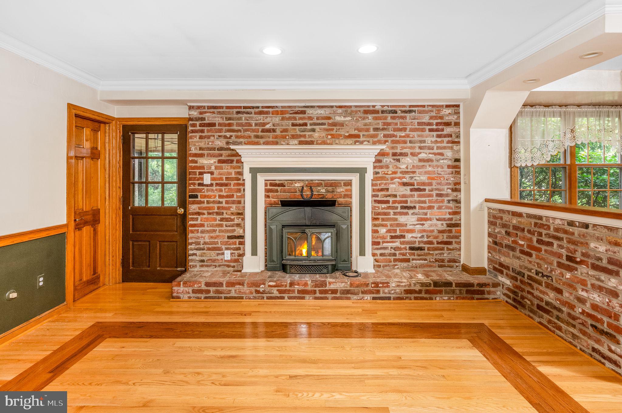 603 Street Road West Chester, PA 19382 - Photo 20 of 41 Family Room with FPl, Brick Wall and Hearth