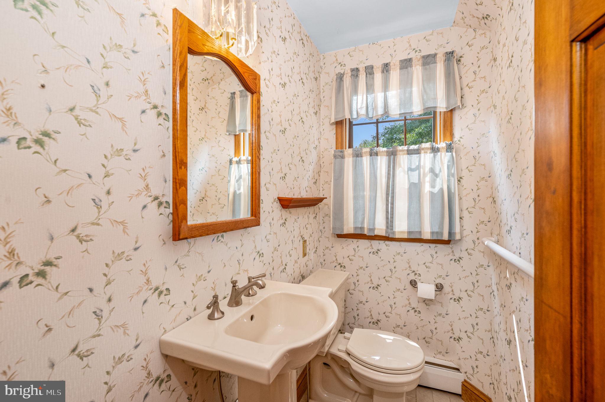 603 Street Road West Chester, PA 19382 - Photo 22 of 41 Convenient Powder Room off the Family Room