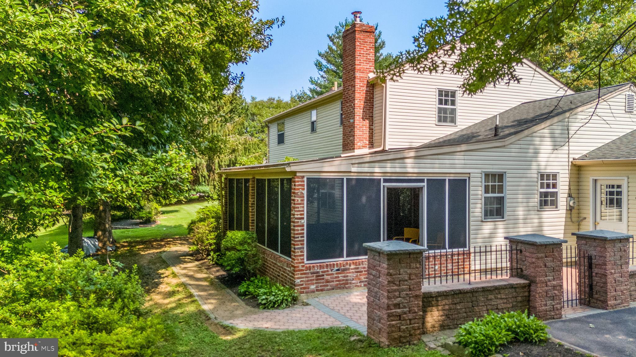 603 Street Road West Chester, PA 19382 - Photo 8 of 41 Screened Porch with Brick