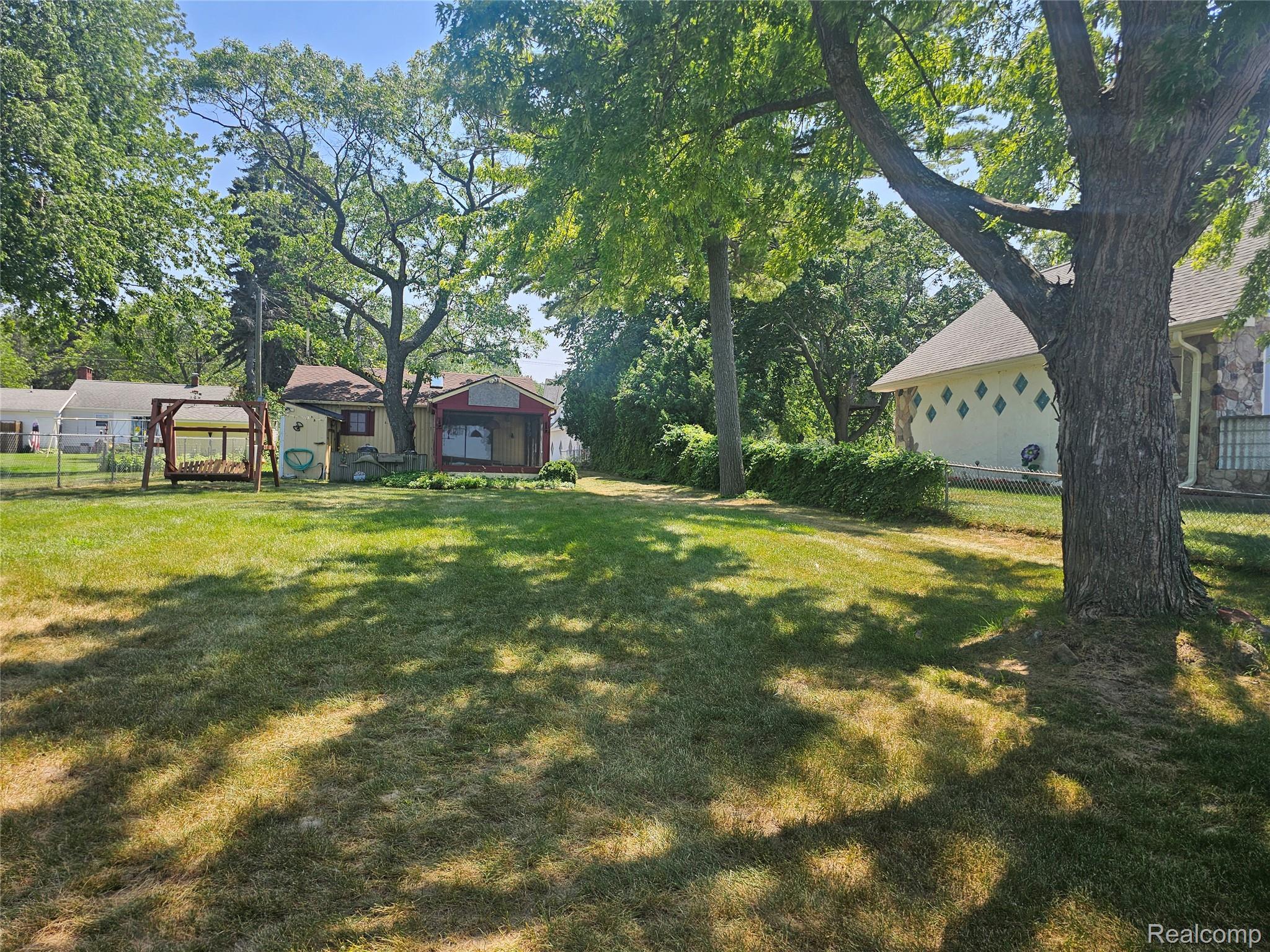 4682 Port Austin Road Caseville, MI 48725 - Photo 20 of 21 Common area view of the lawn.