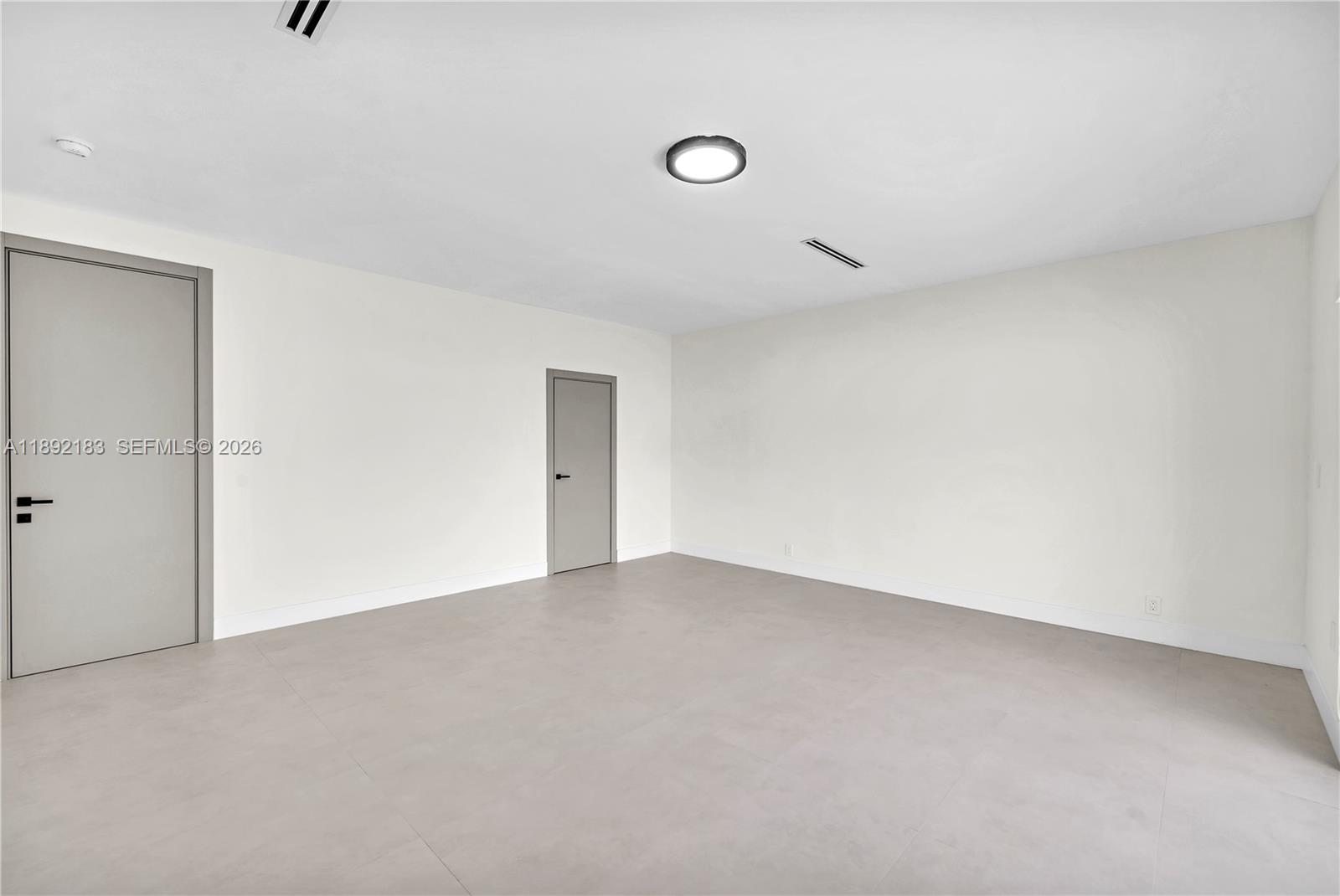 1200 Southwest 23rd Court Miami, FL 33135 - Photo 19 of 36 a view of an empty room