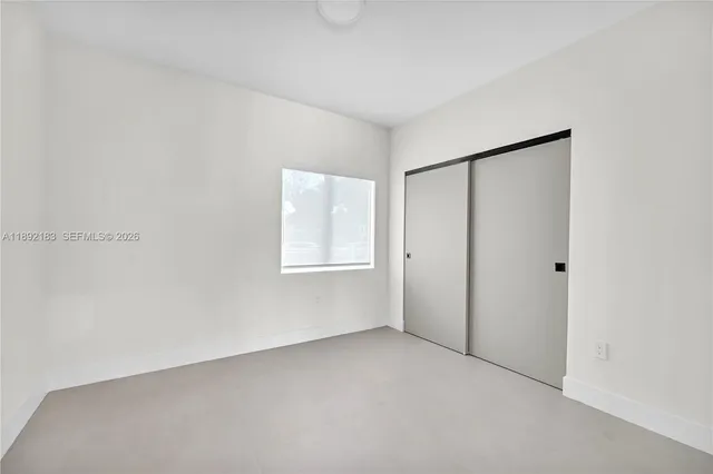 a bathroom with a double vanity sink toilet and shower