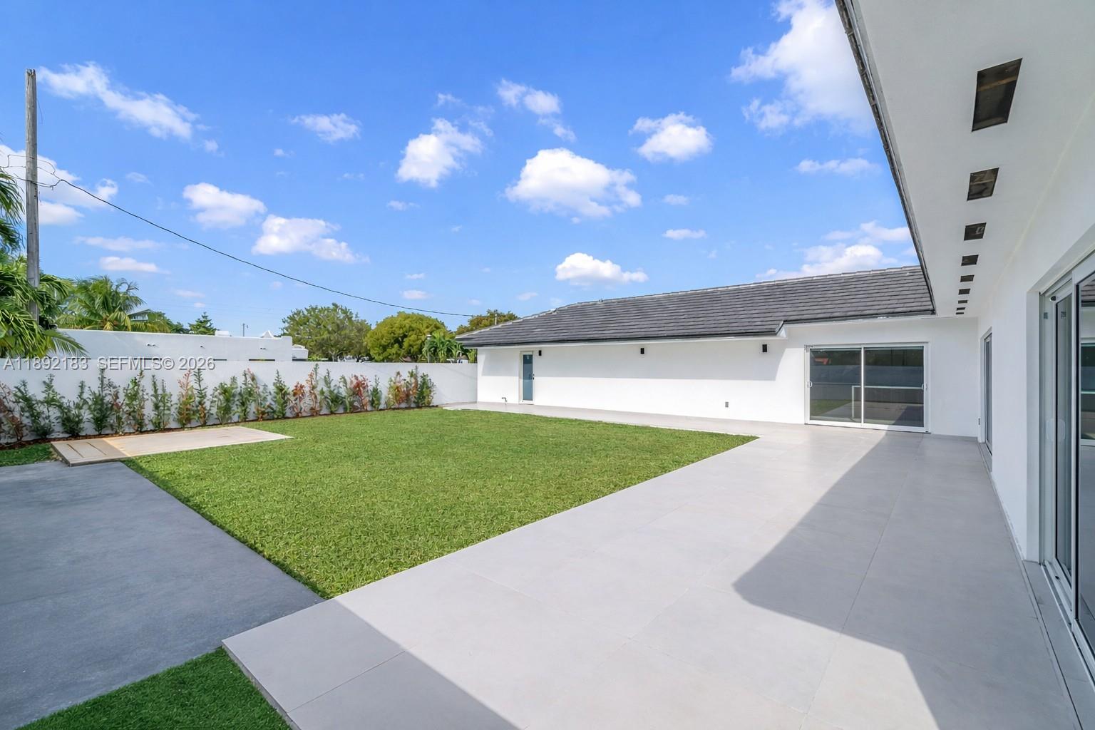 1200 Southwest 23rd Court Miami, FL 33135 - Photo 32 of 36 a view of a back yard of the house