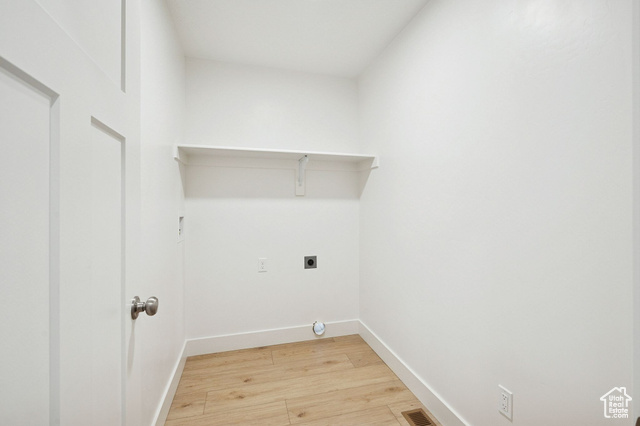 1615 North Angel Street, Unit E Layton, UT 84041 - Photo 26 of 42 Laundry area featuring light wood-style flooring and hookup for an electric dryer