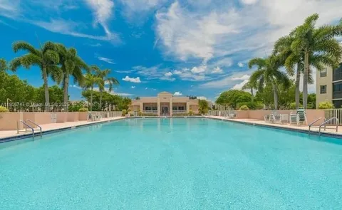 a view of a golf course with a lake