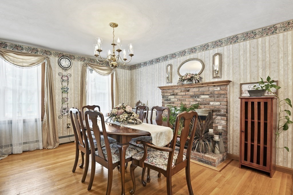 21 Merrill Road Sutton, MA 01590 - Photo 7 of 36 a view of a dining room with furniture and wooden floor