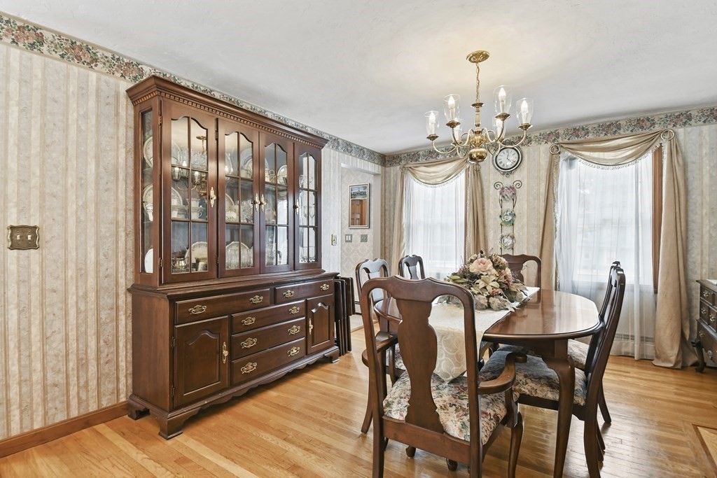 21 Merrill Road Sutton, MA 01590 - Photo 8 of 36 a view of a dining room with furniture window and wooden floor