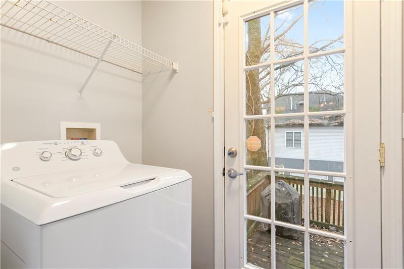 1150 Collier Road Northwest, Unit 3P Atlanta, GA 30318 - Photo 21 of 24 a utility room with dryer and washer