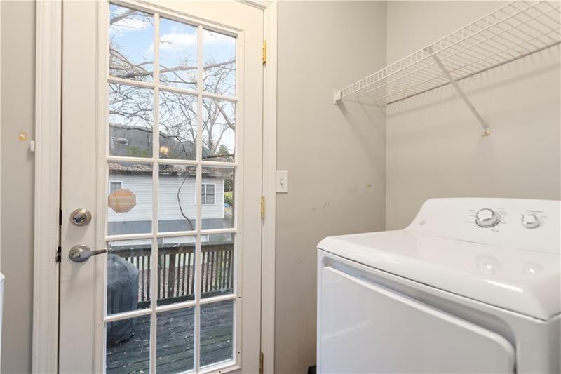 1150 Collier Road Northwest, Unit 3P Atlanta, GA 30318 - Photo 22 of 24 a utility room with dryer and washer