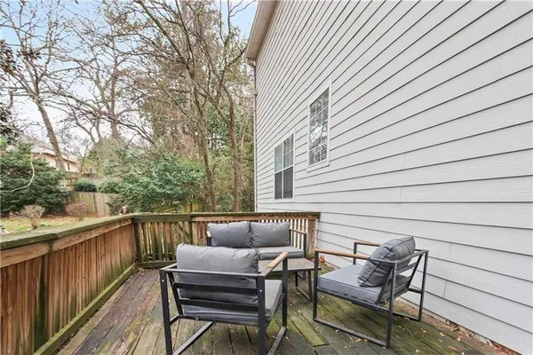 a view of a two chairs in the deck
