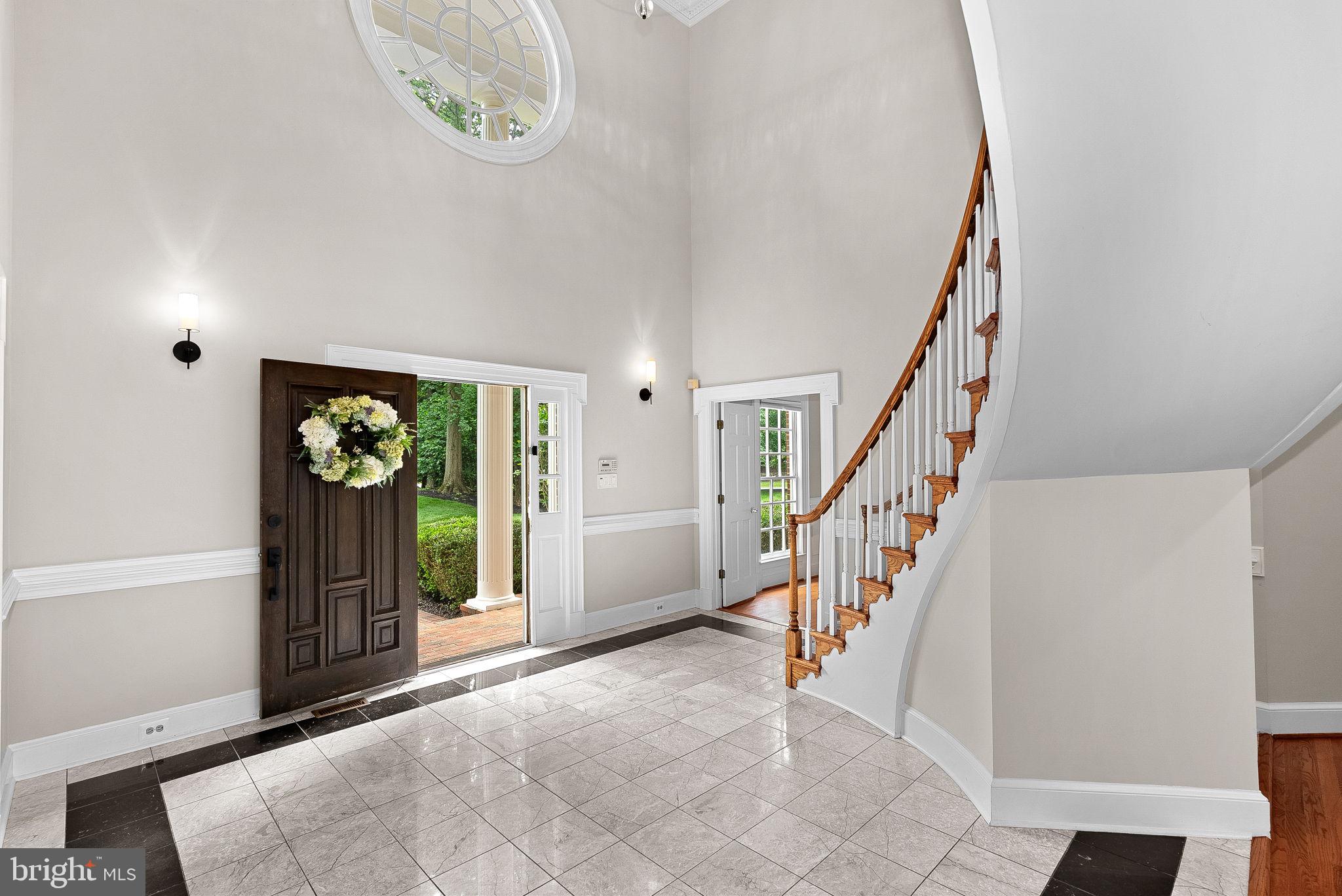 190 Falcon Ridge Road Great Falls, VA 22066 - Photo 2 of 122 Foyer with Floating Staircase