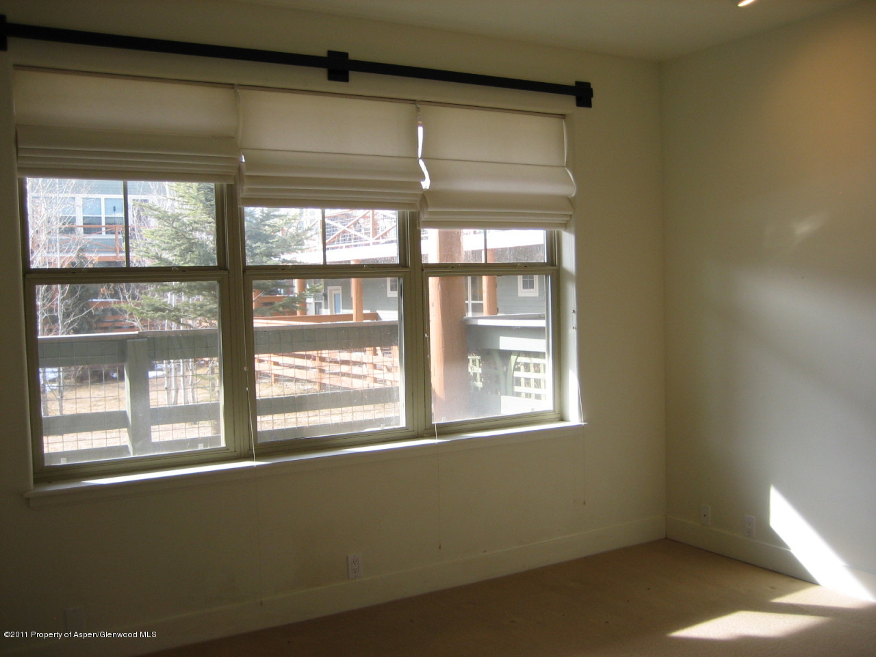 546 Evans Court Basalt, CO 81621 - Photo 6 of 6 a view of an empty room with a window
