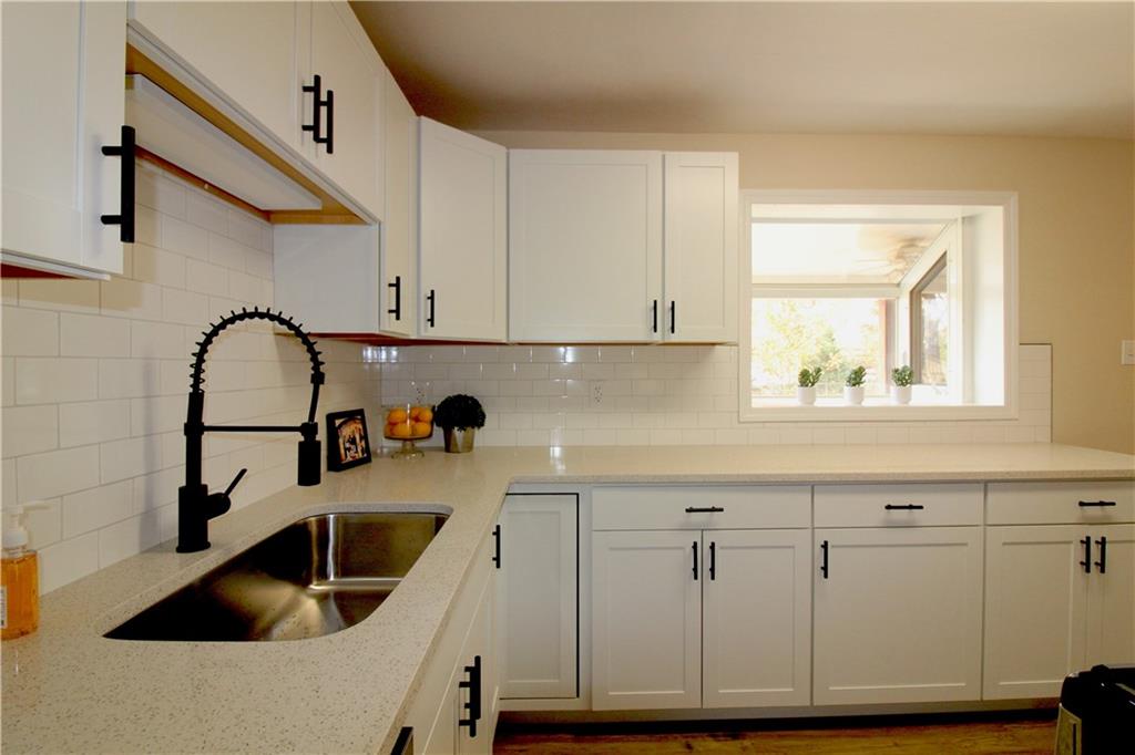38 Highbury Road Cheswick, PA 15024 - Photo 12 of 47 QUARTZ counters and stainless sink.