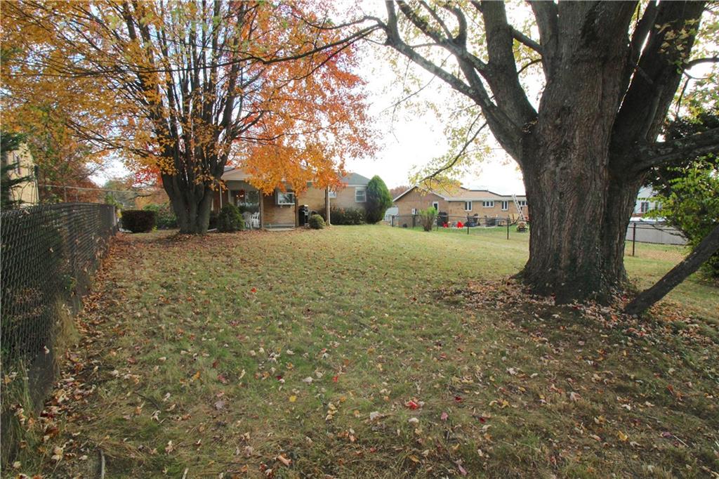 38 Highbury Road Cheswick, PA 15024 - Photo 38 of 47 Partially fenced in yard with mature landscaping.