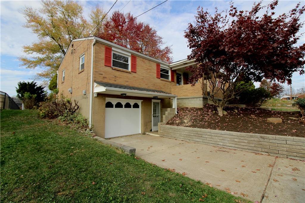38 Highbury Road Cheswick, PA 15024 - Photo 4 of 47 Plenty of level driveway parking and even a garage.