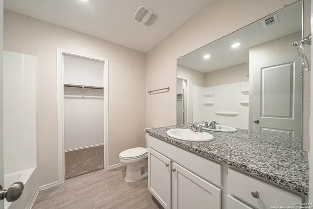 a close up of a bathtub in a bathroom