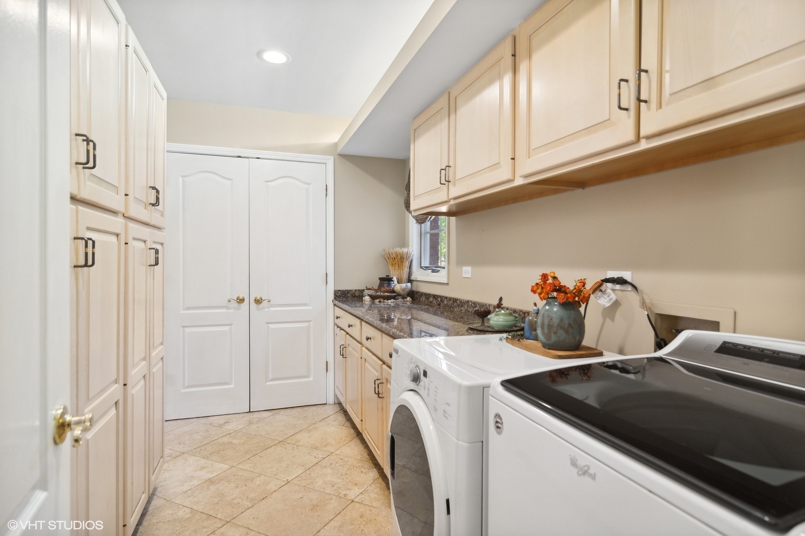 6207 Pine Tree Drive Long Grove, IL 60047 - Photo 17 of 49 a kitchen with a sink cabinets and a stove top oven