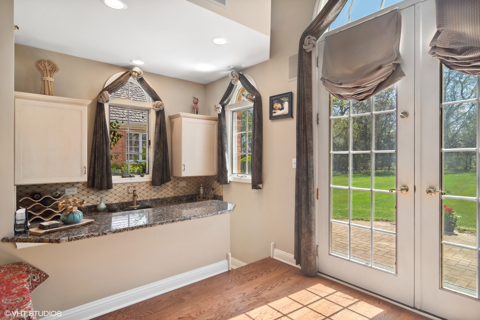 6207 Pine Tree Drive Long Grove, IL 60047 - Photo 20 of 49 a bathroom with a granite countertop sink and a mirror