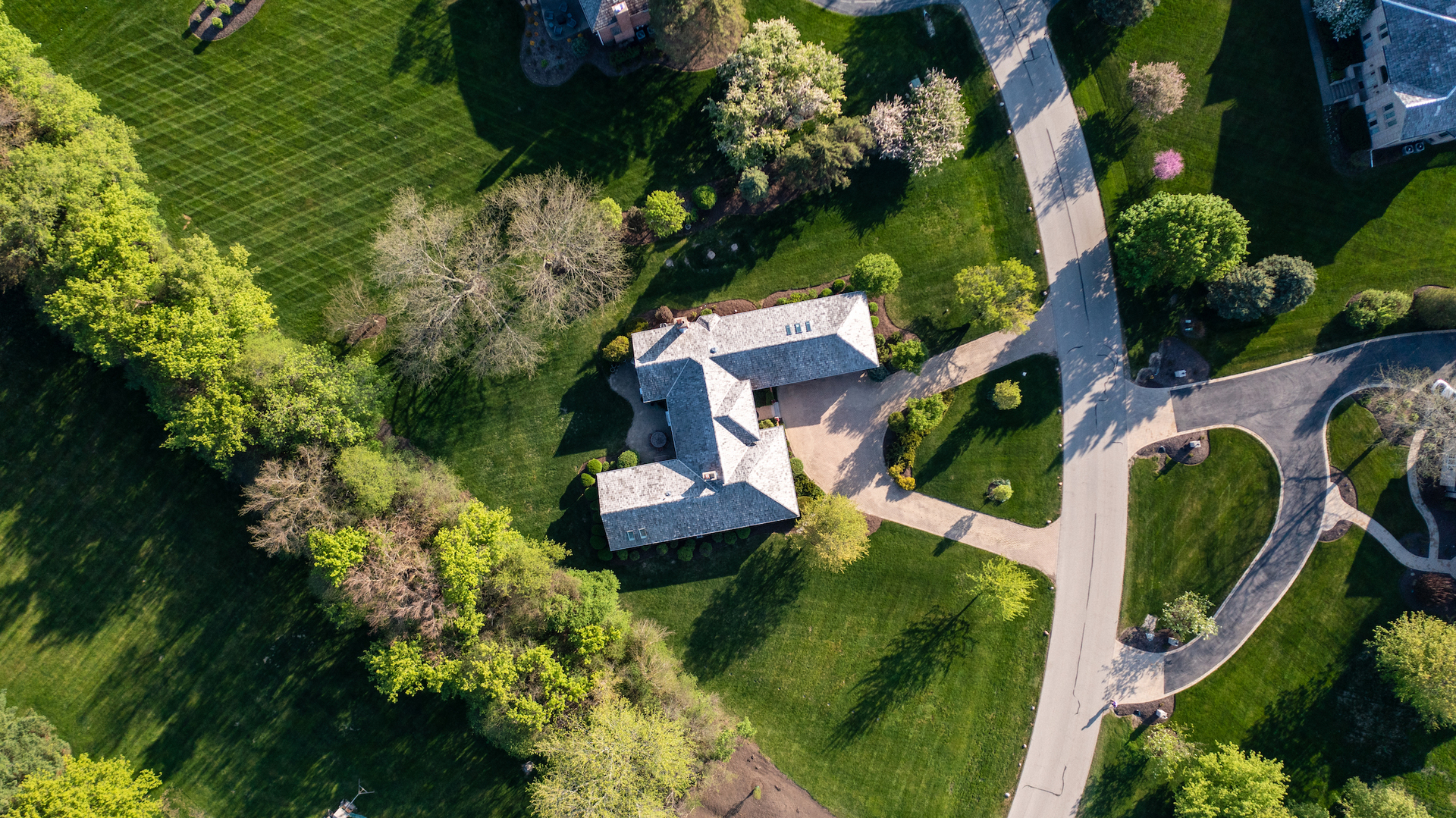 6207 Pine Tree Drive Long Grove, IL 60047 - Photo 2 of 49 an aerial view of residential house with outdoor space and trees all around