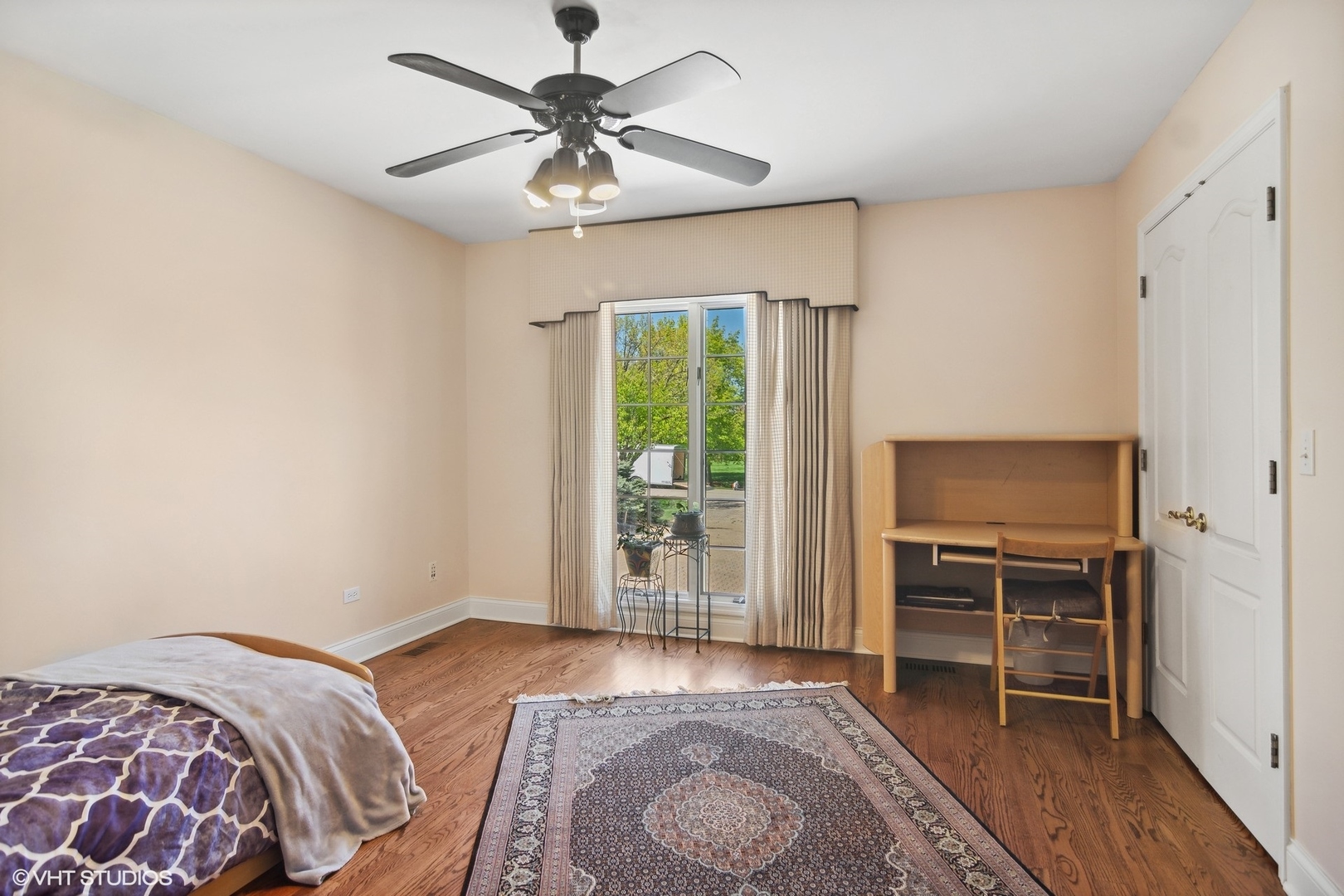 6207 Pine Tree Drive Long Grove, IL 60047 - Photo 26 of 49 a bedroom with a bed and a television