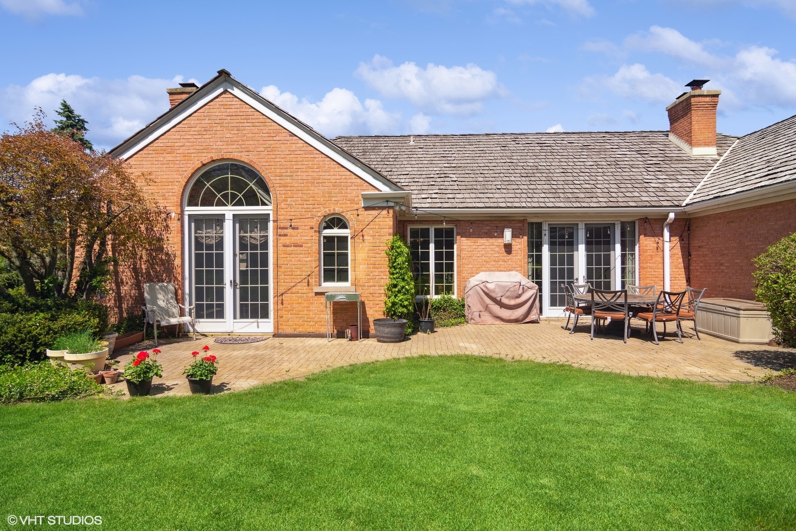 6207 Pine Tree Drive Long Grove, IL 60047 - Photo 36 of 49 a front view of a house with patio