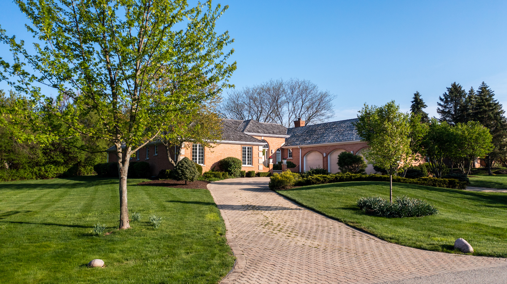 6207 Pine Tree Drive Long Grove, IL 60047 - Photo 49 of 49 a house with green field in front of it