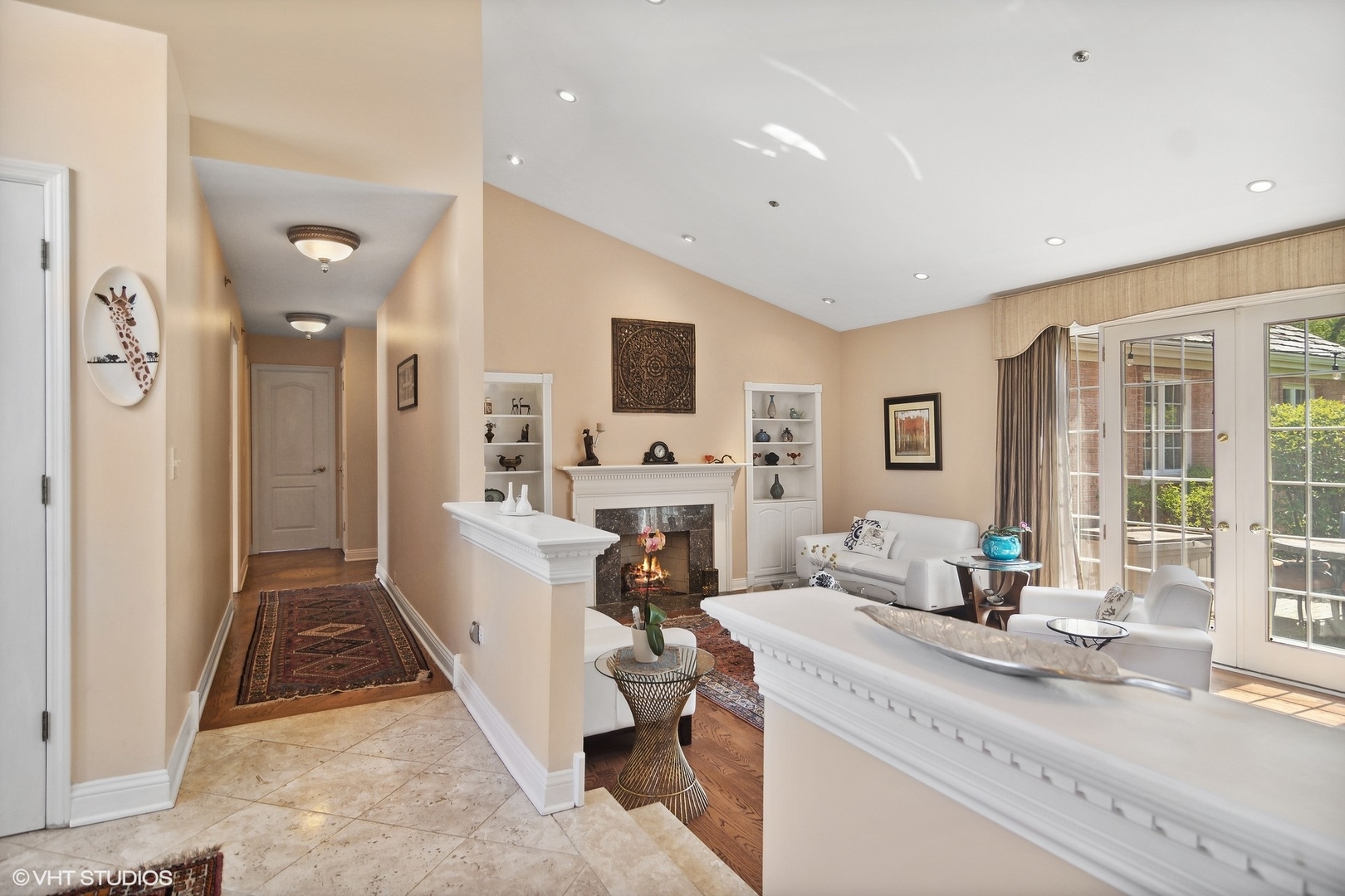 6207 Pine Tree Drive Long Grove, IL 60047 - Photo 8 of 49 a living room with furniture a fireplace and a flat screen tv