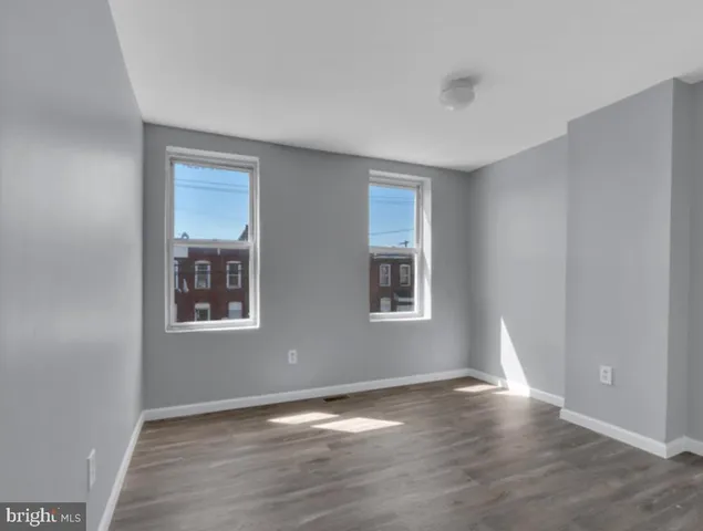 a view of a hallway with washer and dryer