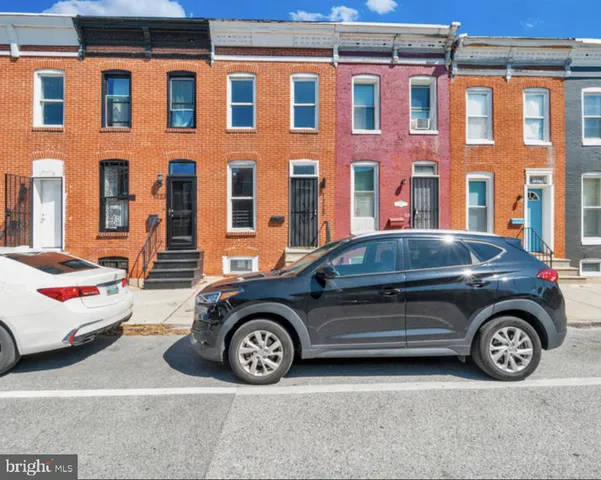 a car parked in front of a building
