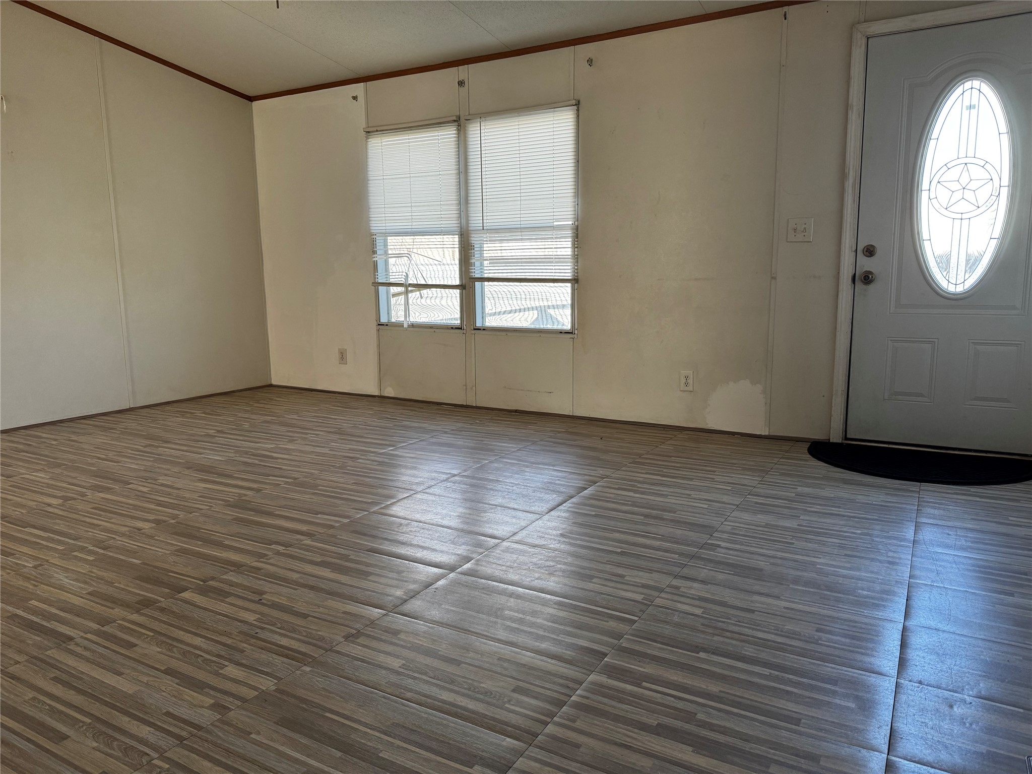 15930 Boss Gaston Road Sugar Land, TX 77498 - Photo 19 of 20 an empty room with wooden floor and windows