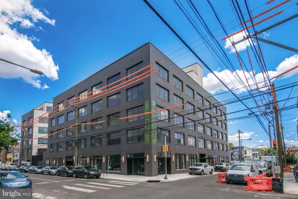 a front view of a building with street view