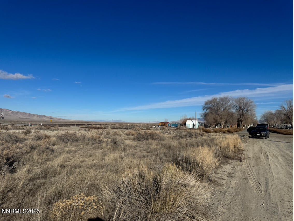 610101 Callahan Road Imlay, NV 89418 - Photo 27 of 28 a view of a dry yard with wooden fence