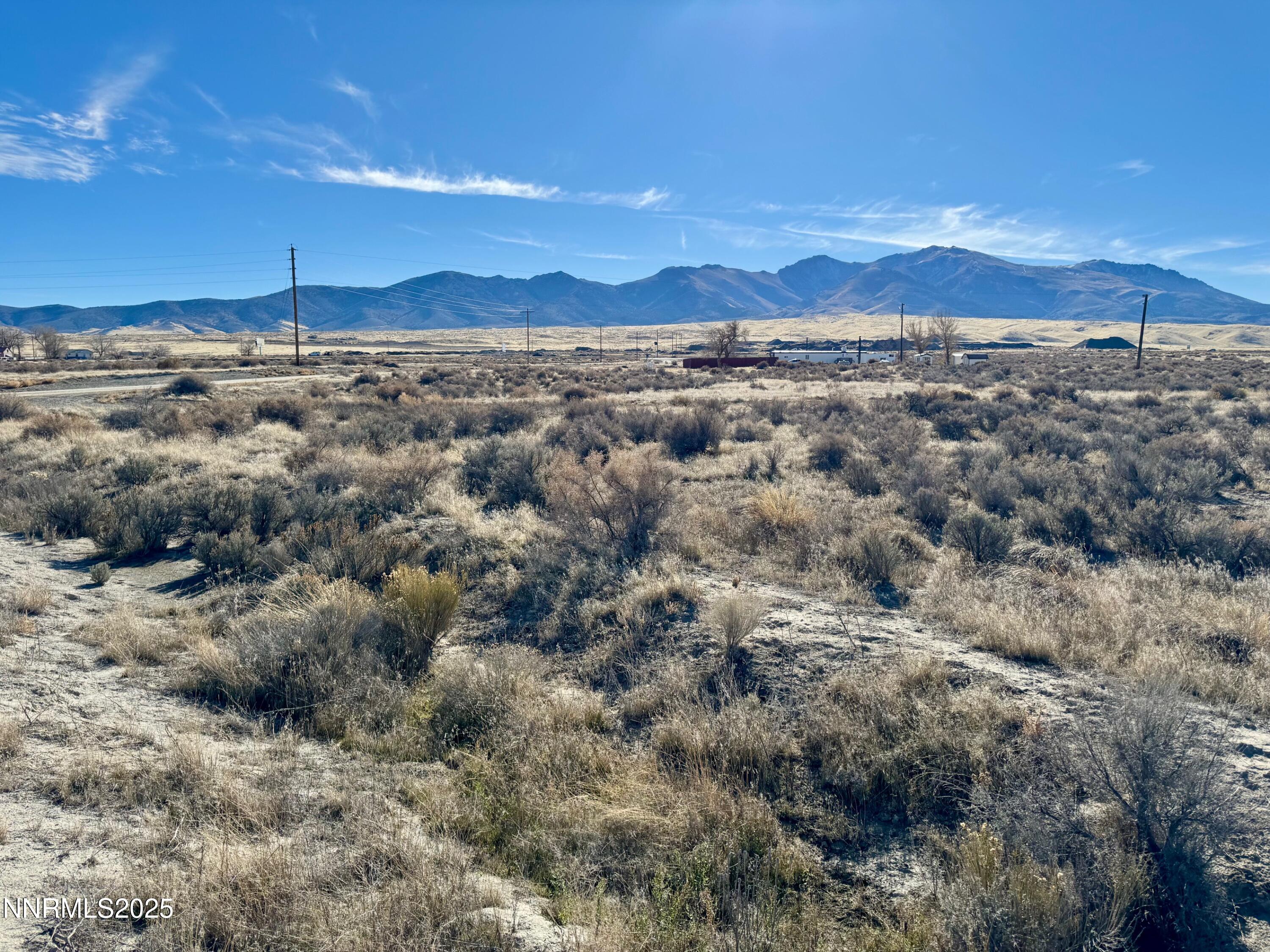 610101 Callahan Road Imlay, NV 89418 - Photo 3 of 28 a view of a yard with a mountain