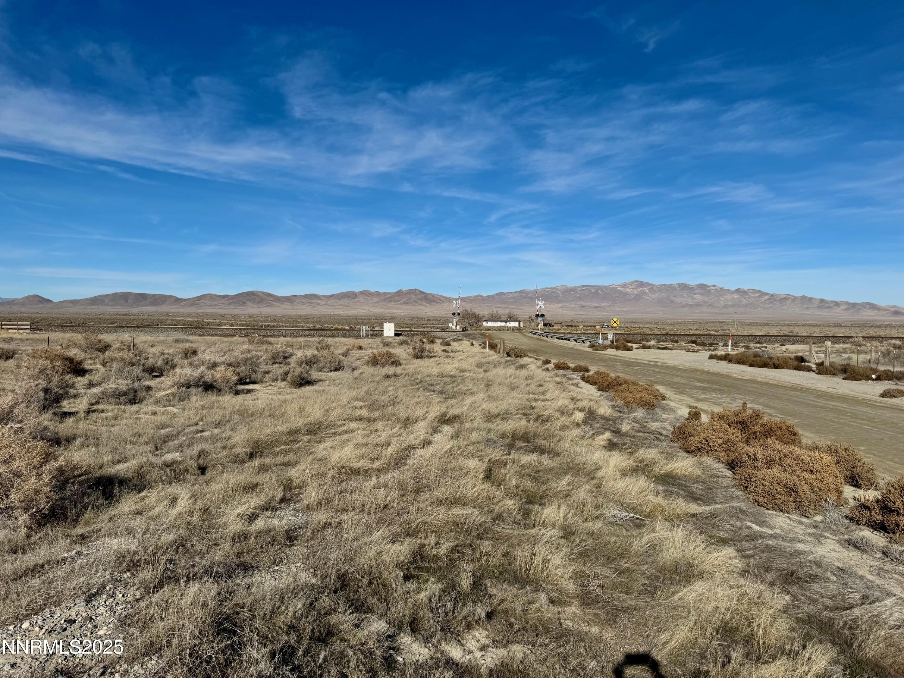 610101 Callahan Road Imlay, NV 89418 - Photo 6 of 28 a view of a field with an ocean