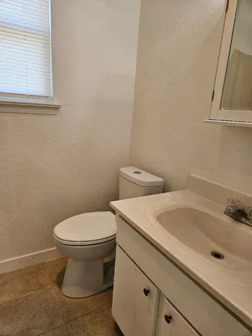 a bathroom with a sink and a toilet