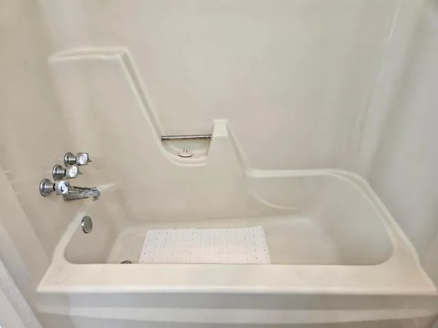 a bathroom with a bathtub
