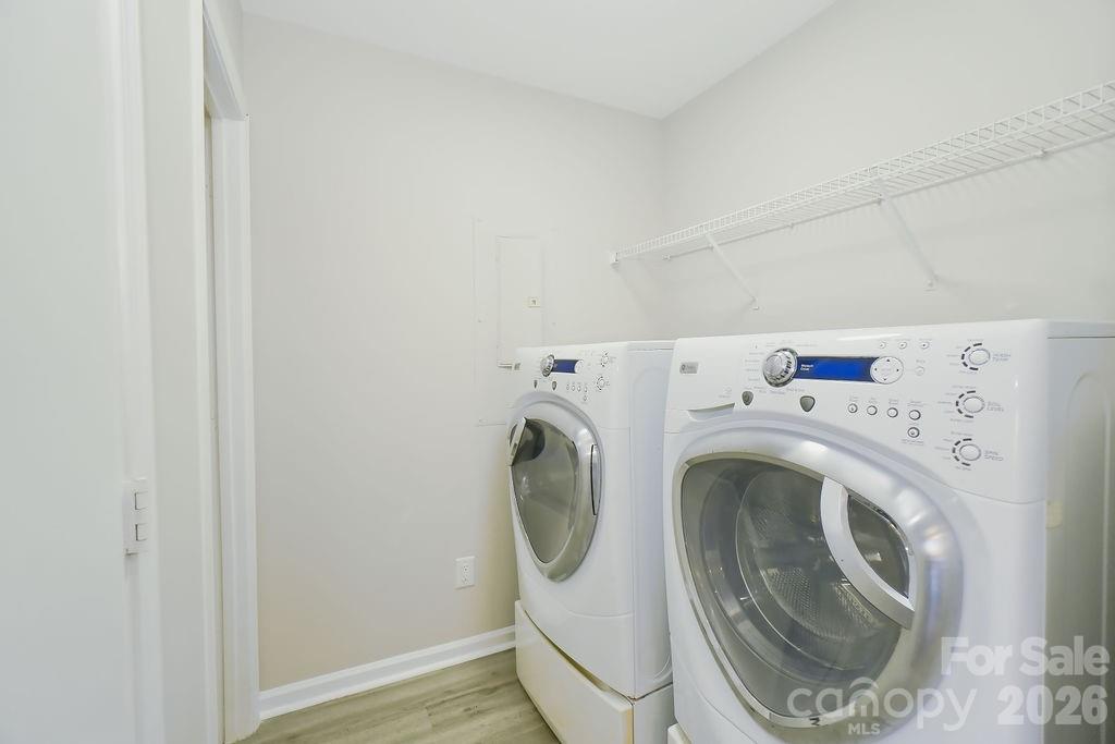9614 Rau Court Charlotte, NC 28215 - Photo 16 of 21 a utility room with dryer and washer